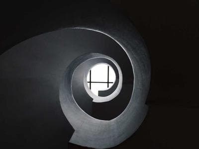 Two desktop printers on an office desk