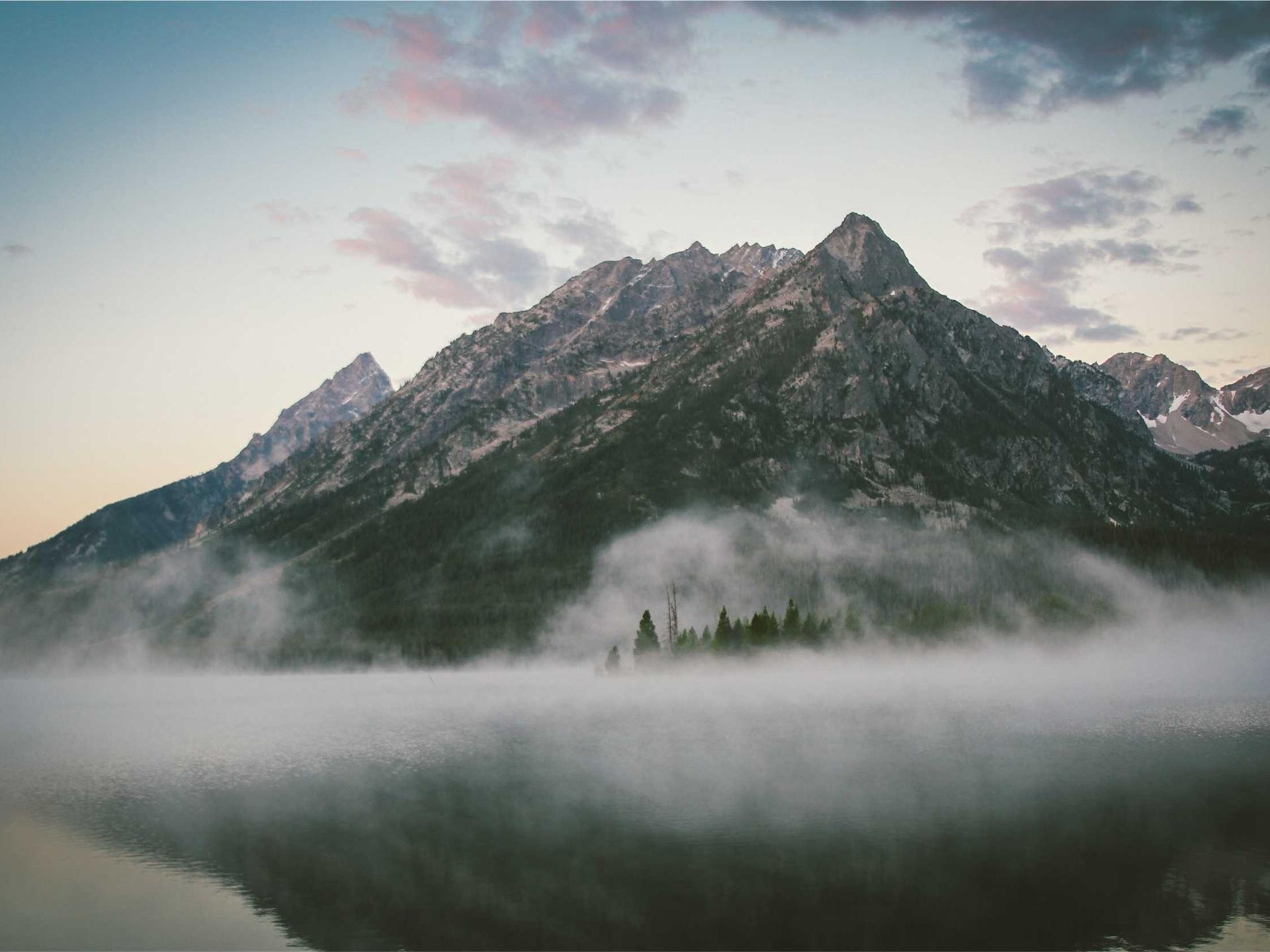 Close-up of a well-seasoned carbon steel pan with a glossy dark patina